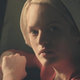 Elisabeth Moss as Offred.